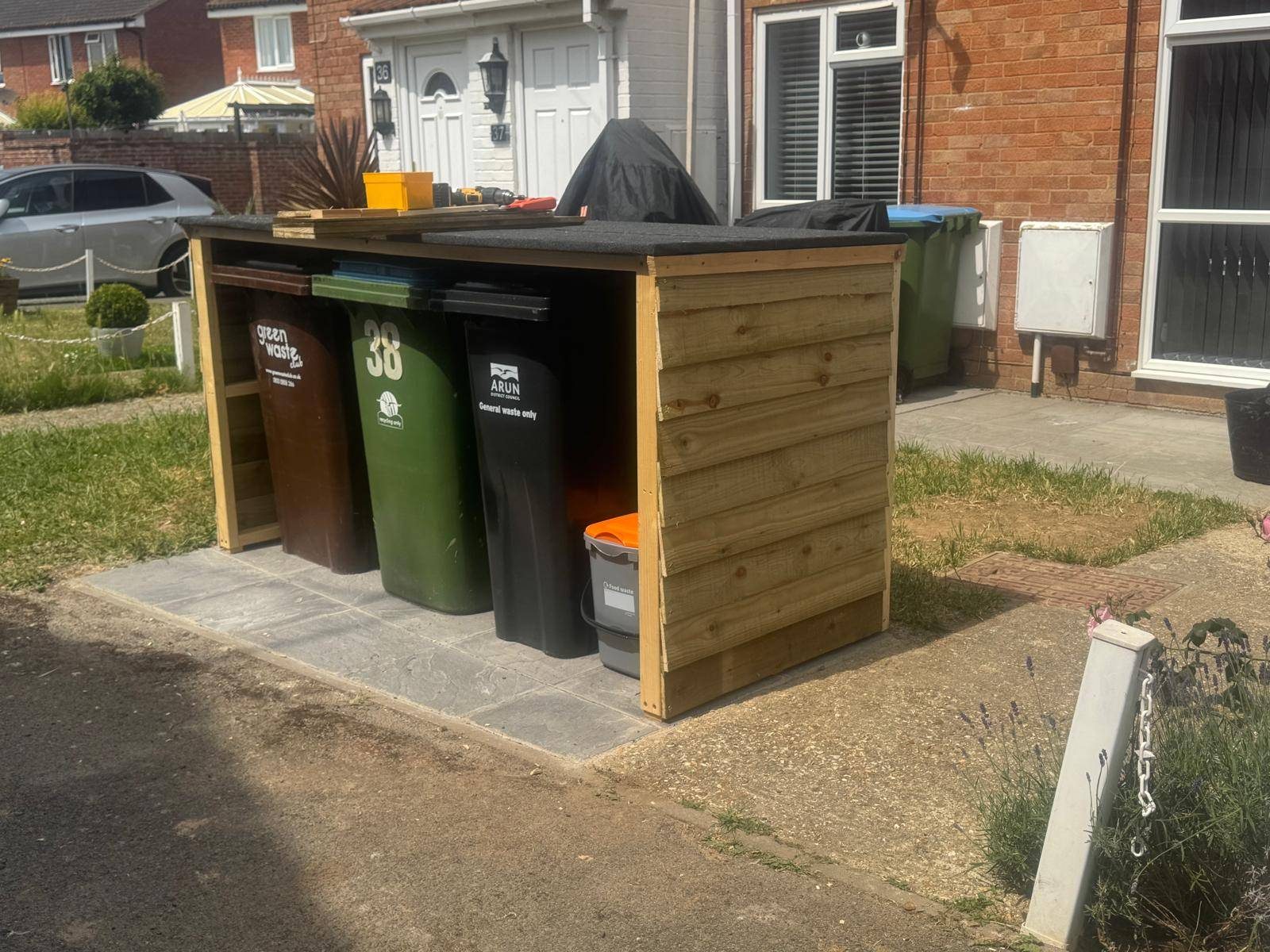 Finished timber bin store with bins inside