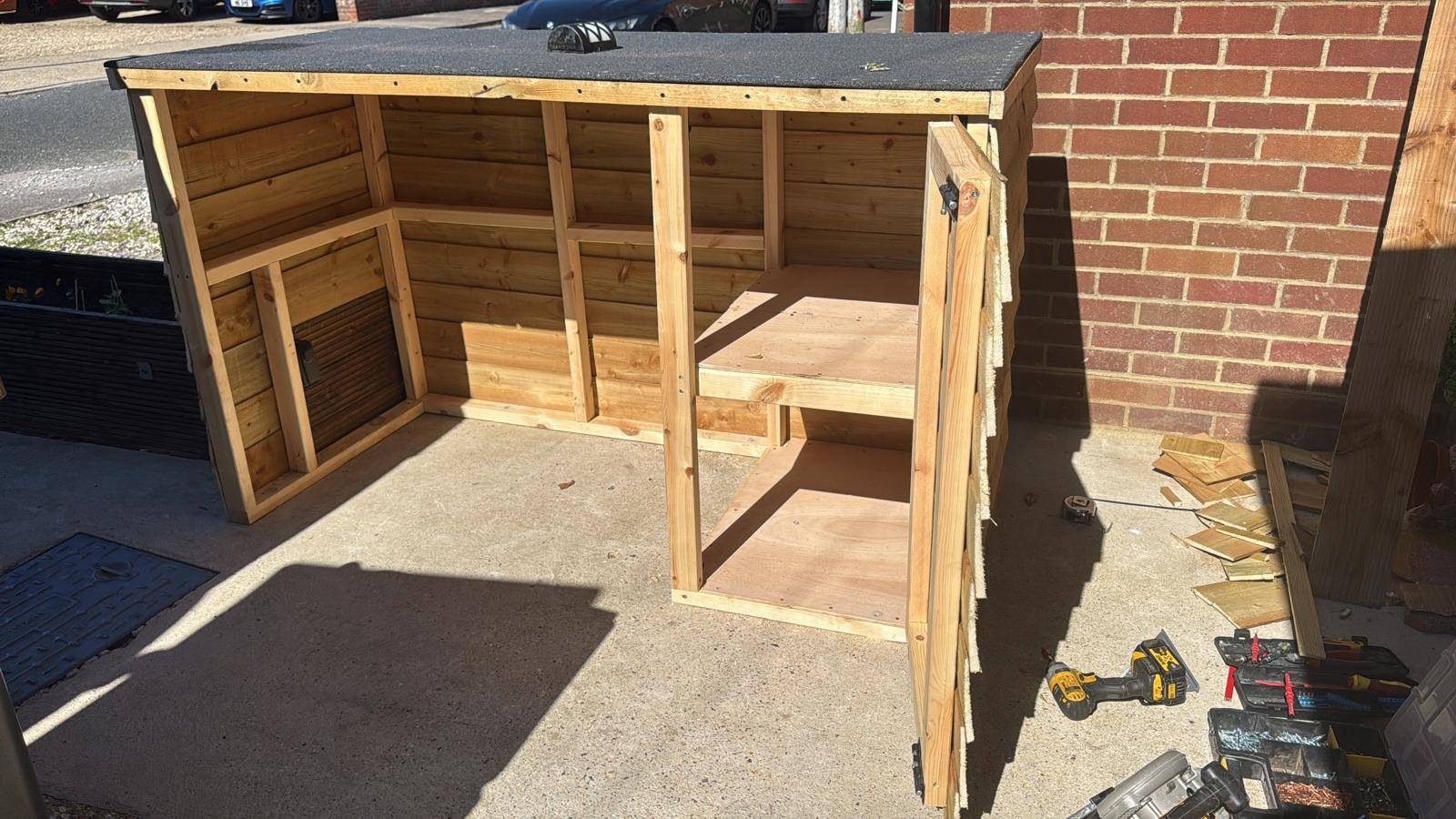 Open timber bin store frame with roof fitted