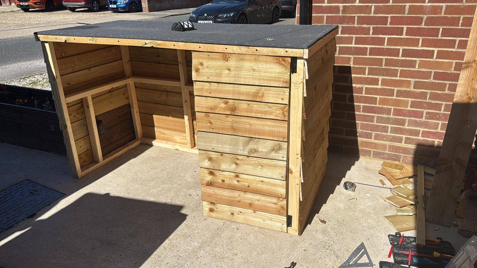 Bin store side cladding and timber finish