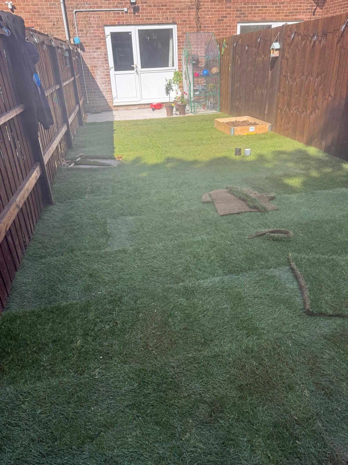 Freshly turfed garden after work