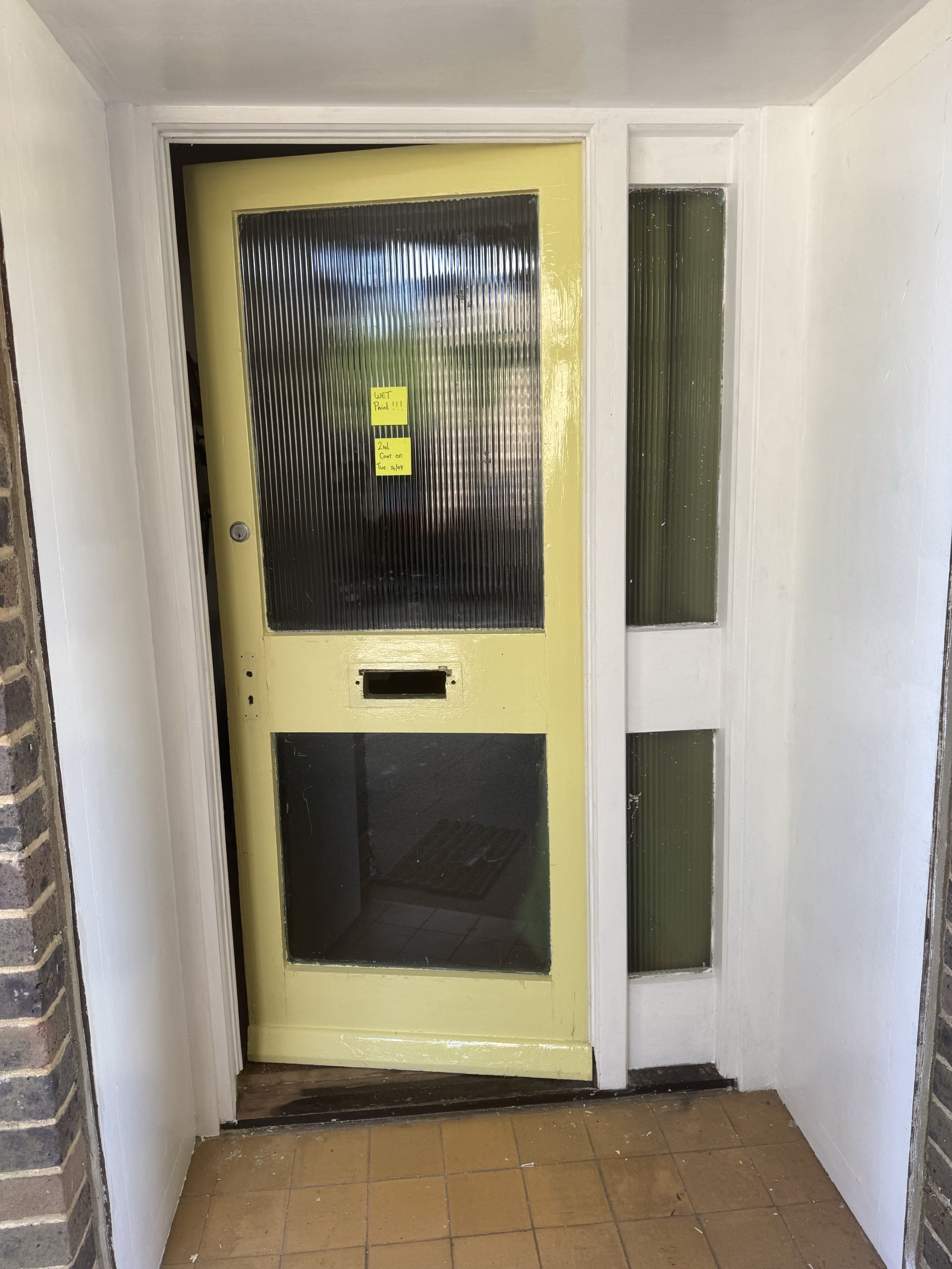 Front door and entrance surround after repainting