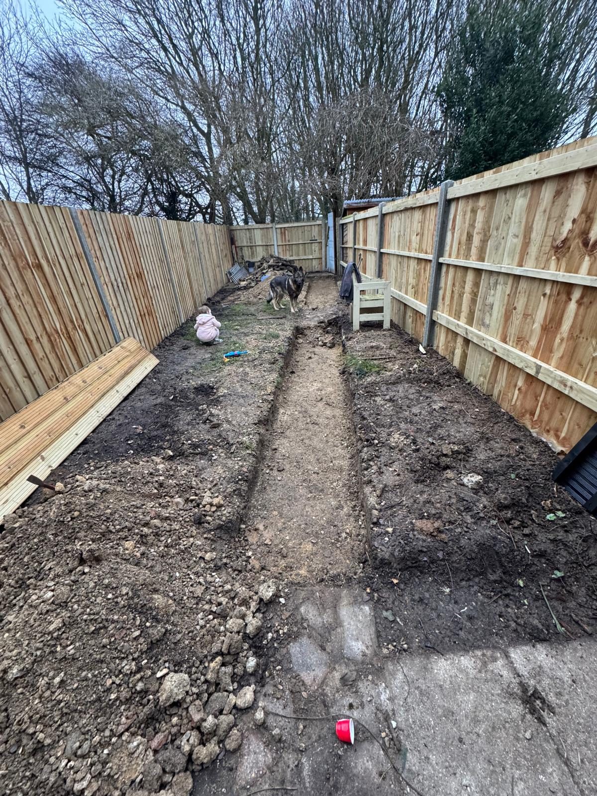 Garden pathway preparation and fencing work