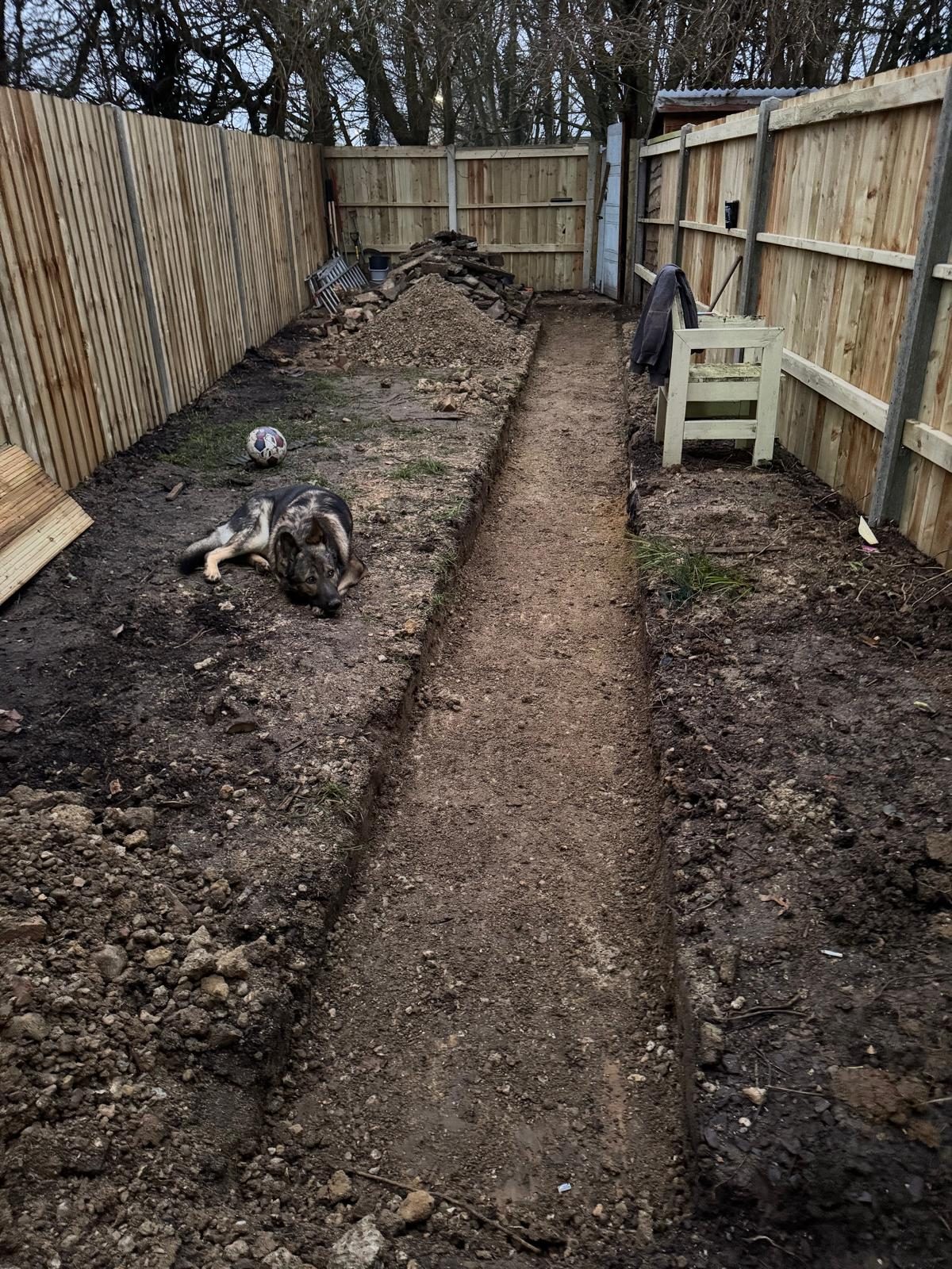 Pathway base prepared with fencing in place