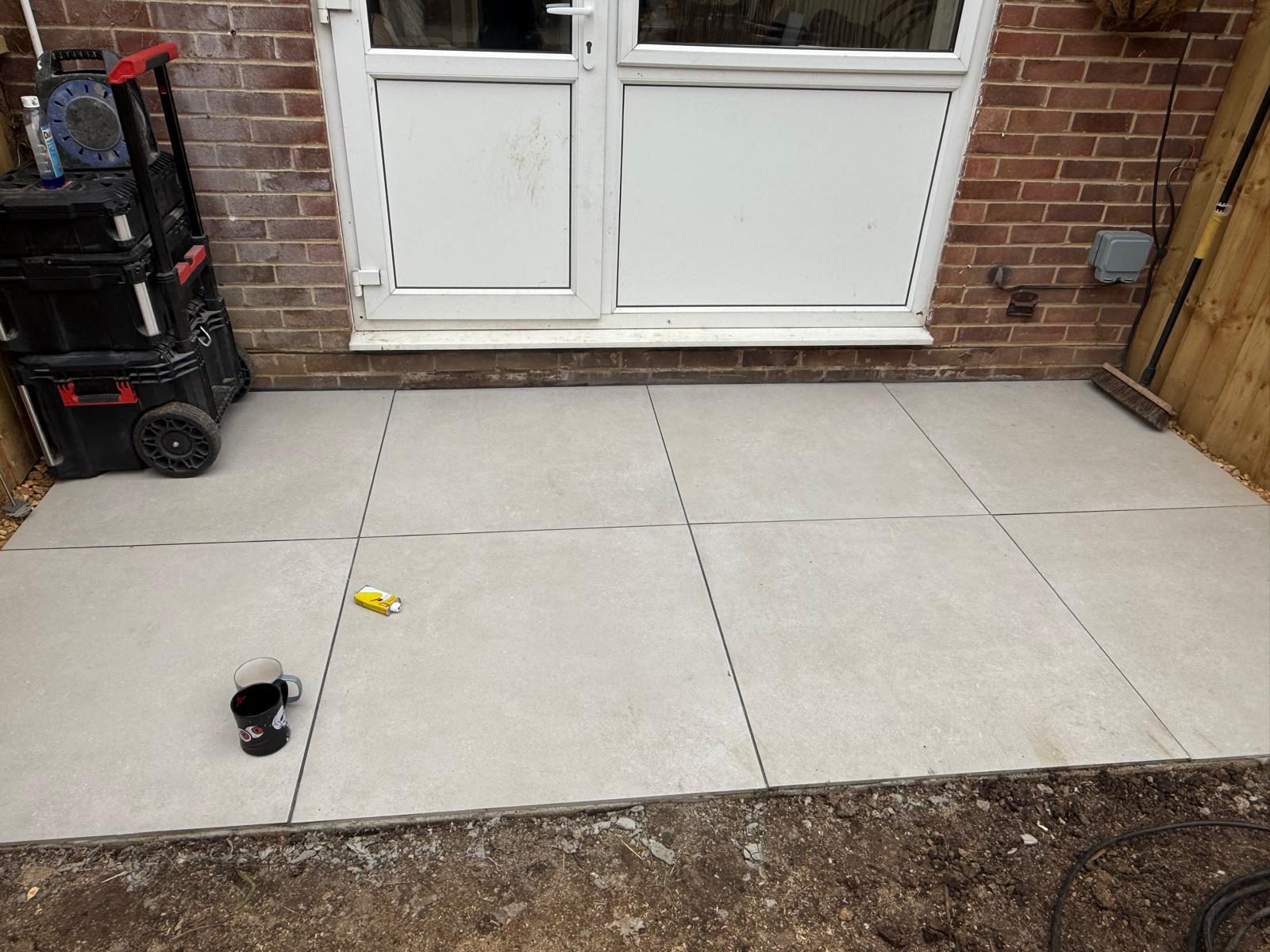 New patio slabs fitted outside rear doors